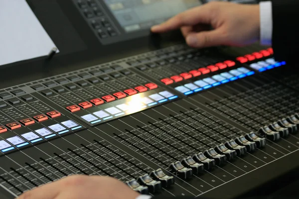 Sound mixing board with male hands — Stock Photo, Image