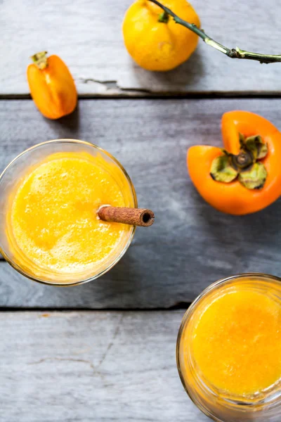 Persimmon with orange smoothie — Stock Photo, Image