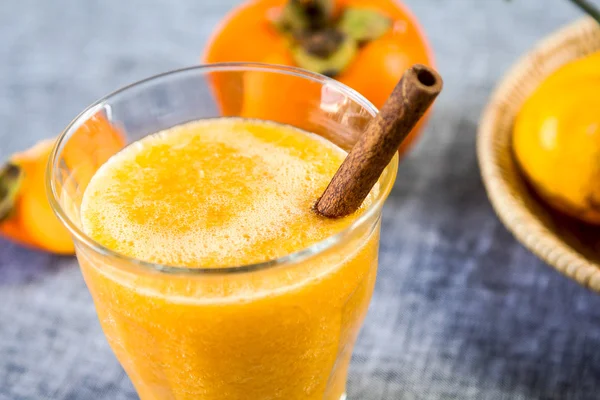 Persimmon with orange smoothie — Stock Photo, Image