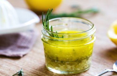 Rosemary and garlic lemon salad dressing clipart