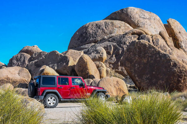 Joshua Tree NP, CA, USA - January 21, 2020: A Jeep Wrangler Unlimited Sports parked along the reserve park