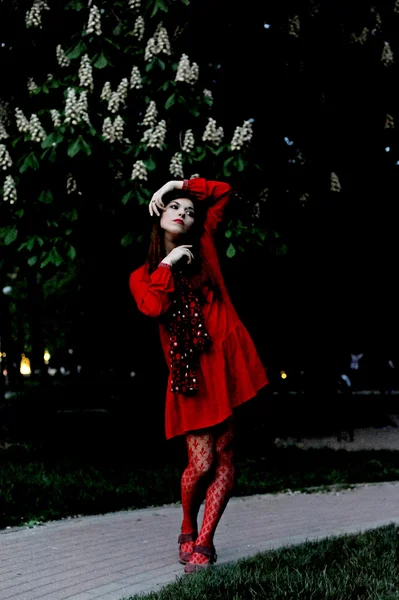 The girl in a red dress — Stock Photo, Image