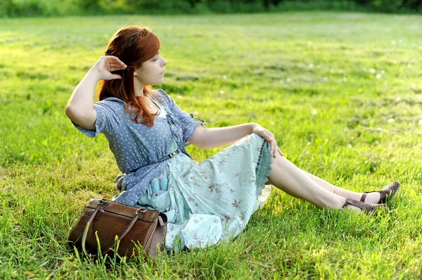 The girl on a grass — Stock Photo, Image