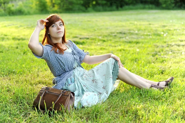 The girl at a pond — Stock Photo, Image