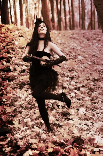 Mademoiselle in Bois de Boulogne Paris, Violinist girl in little black dress, Violinist sexual brunette — Stock Photo, Image