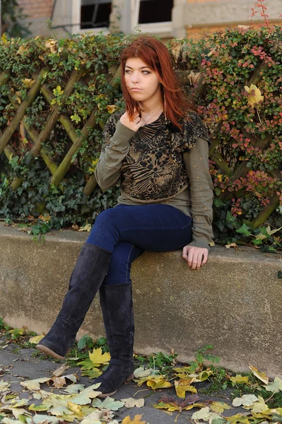 Girl with red hair in the fall — Stock Photo, Image