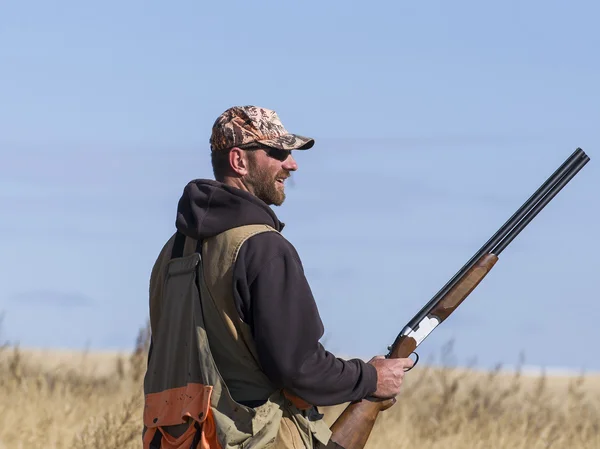 A hunter out on the prairie — Stock Photo, Image