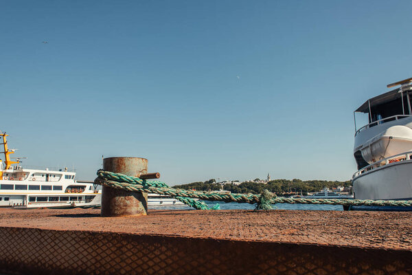 Rope of moored ship on pier in Istanbul, Turkey 