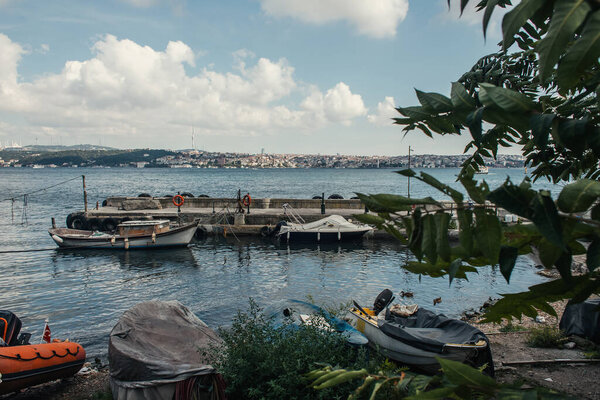 Moored boats near pier in sea of Istanbul, Turkey 