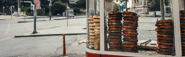 Traditional turkish pastry on concession stand on unban street, Istanbul, Turkey, banner 
