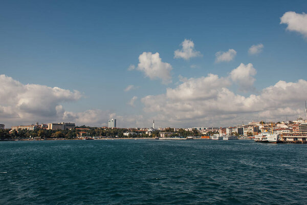 Sea and buildings on coast of Istanbul with sky at background, Turkey 