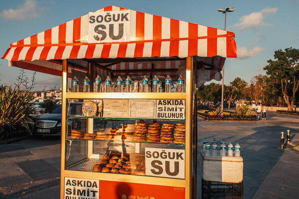 ISTANBUL, TURKEY - NOVEMBER 12, 2020: Concession stand with bagels and water on urban street 