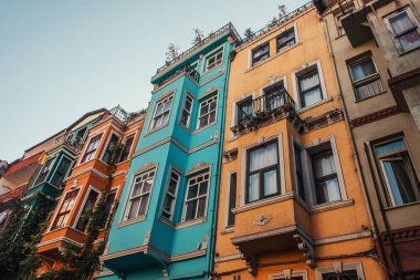 low angle view of colorful, decorated houses in Balat quarter, Istanbul, Turkey clipart