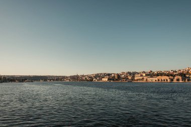 Bosphorus strait and buildings on seafront clipart