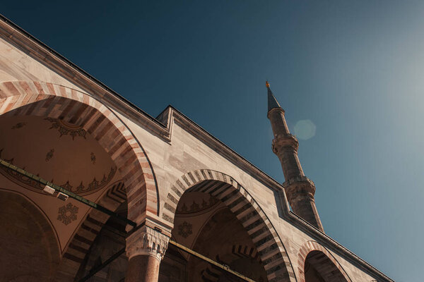 low angle view of decorated arches of Mihrimah Sultan Mosque, Istanbul, Turkey