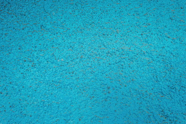 текстурированная поверхность с синей штукатуркой, вид сверху