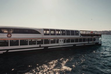 moored touristic ship in Bosphorus strait, Istanbul, Turkey clipart