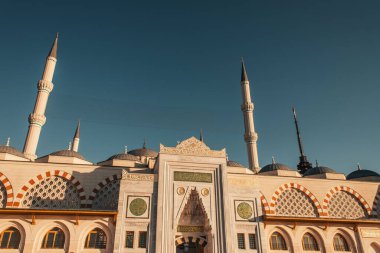 front facade of Mihrimah Sultan Mosque against cloudless sky, Istanbul, Turkey clipart