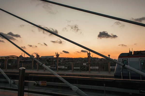 ISTANBUL, TURKEY - NOVEMBER 12, 2020: Train on Golden horn metro bridge and sunset sky at background — Stock Photo