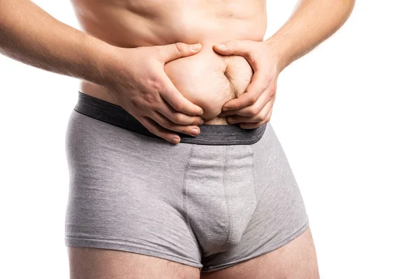 Homem segurando o excesso de gordura da barriga — Fotografia de Stock