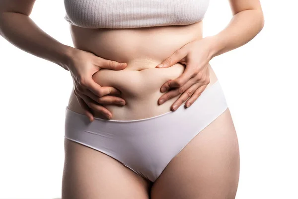 Mulher gorda medindo seu estômago — Fotografia de Stock