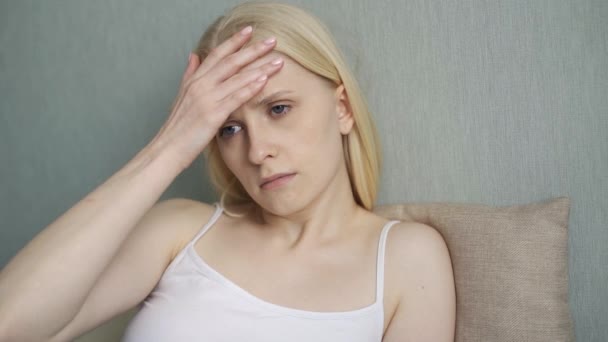 Upset tired woman feel pain coping with morning headache concept — Stock Video