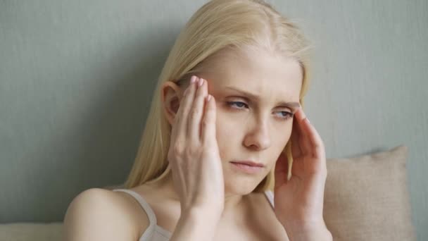 Upset tired woman feel pain coping with morning headache concept — Stock Video