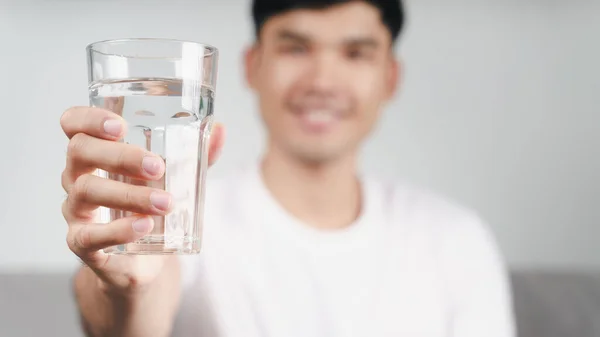 Handsome Asian Man Drinking Glass Water Sofa Living Room — Stock Photo, Image