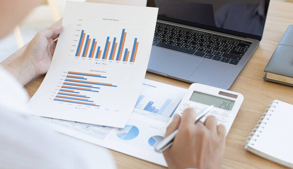 Head of marketing has analyzed the financial income graph of the company in order to develop the structure of the company to be ready for the economy in the future. Financial results analysis concept.