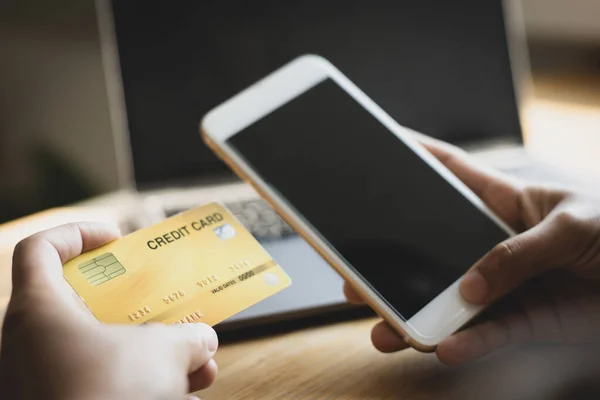 Women use smart phone to register online purchases using credit card payments, Technology for the use of smartphones for business or online financial transactions, Shopping online and banking online concept.