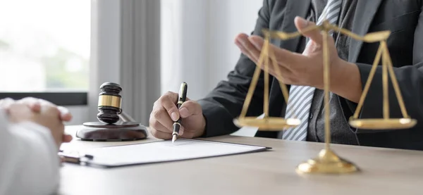 Attorney or judge provides legal advice to the client in the courtroom, Ethics in the courts include justice and impartiality, legal consultant, scales of justice, law hammer, Litigation and justice.