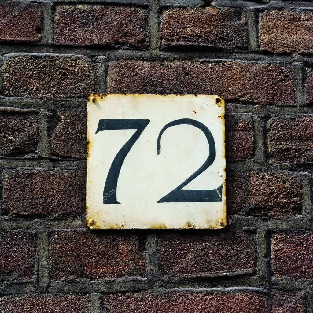House number 72 Stock Photo by ©papparaffie 110380406