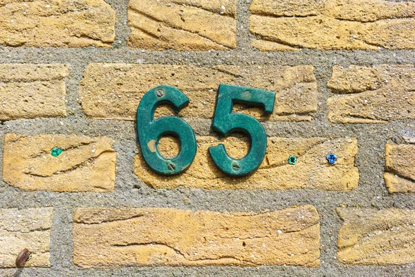 House number 65 — Stock Photo, Image