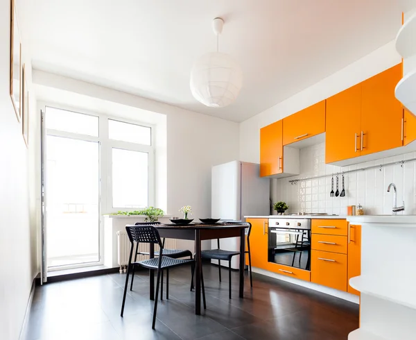 Modern orange kitchen — Stock Photo, Image