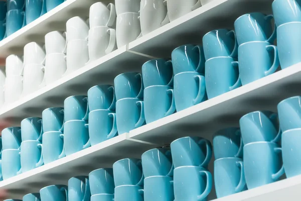 Cups on the shelves — Stock Photo, Image