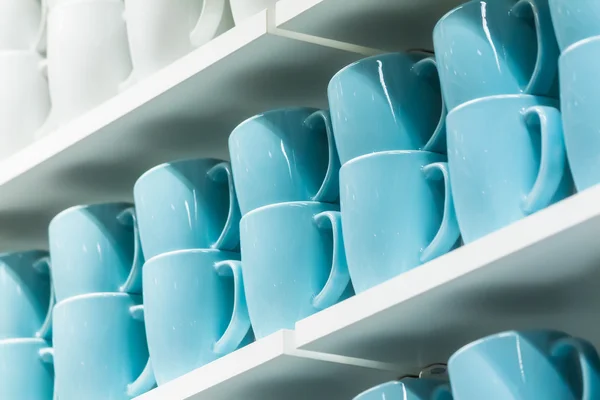 Cups on the shelves — Stock Photo, Image