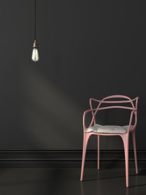 Pembe sandalye ve ampul bir koyu gri duvarının yakınında