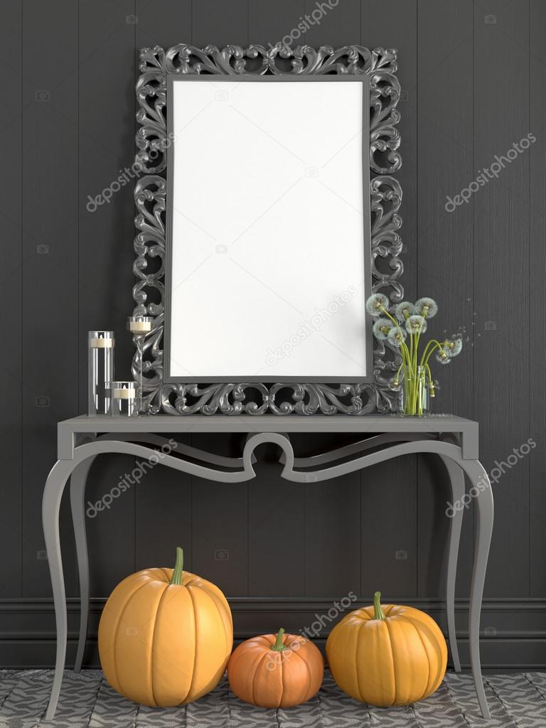 Grey  frame on the table and fall decor of pumpkins