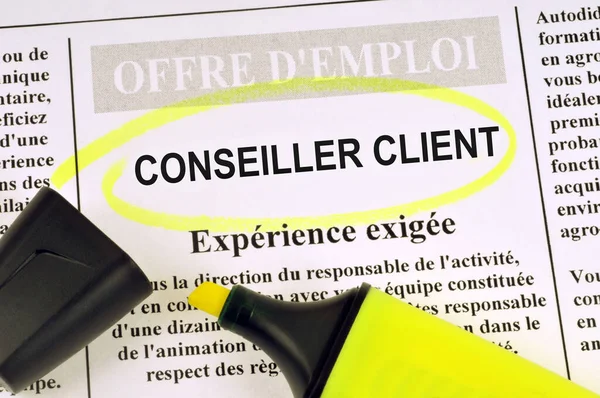 Job offer concept from a French newspaper asking for a customer advisor with experience