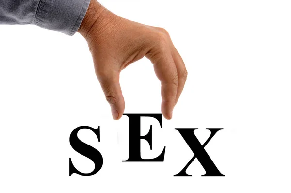 白い背景にセックスという言葉を書く手 — ストック写真