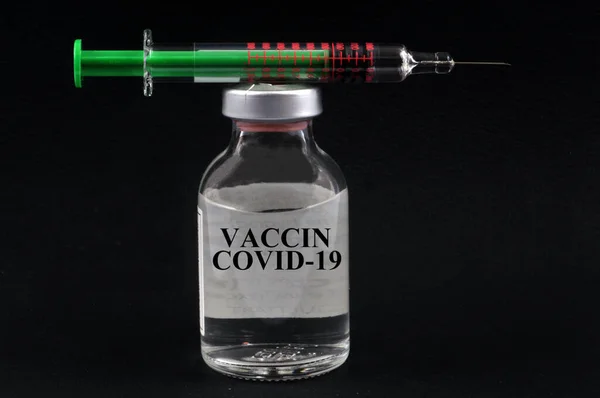 Concepto Francés Vacuna Covid Con Vial Jeringa Sobre Fondo Negro —  Fotos de Stock