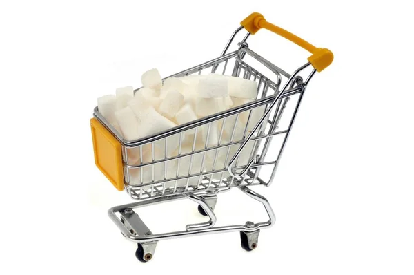 Carro Supermercado Lleno Terrones Azúcar Cerca Sobre Fondo Blanco —  Fotos de Stock