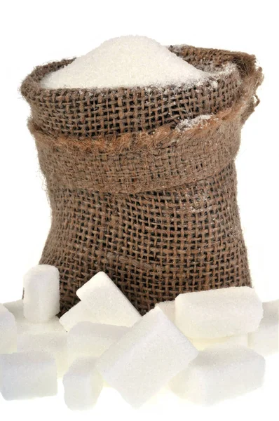 Sugar Cubes Next Bag Powdered Sugar Close White Background — Stock Photo, Image