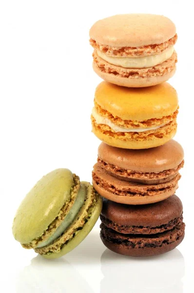 Macaroons Different Flavors Stacked Close White Background — Stock Photo, Image