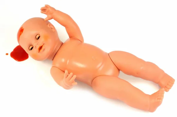 Concept Injured Child Bleeding Head Plastic Doll Close White Background — Stock Photo, Image