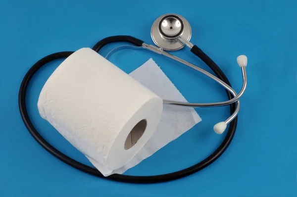Constipation Concept Toilet Paper Roll Stethoscope Blue Background — Stock Photo, Image