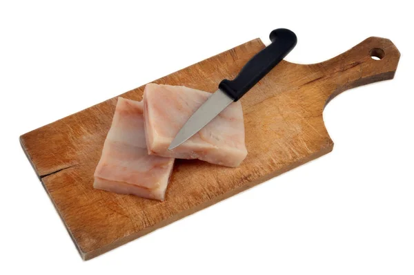 Pezzi Nasello Crudo Tagliere Con Coltello Primo Piano Sfondo Bianco — Foto Stock