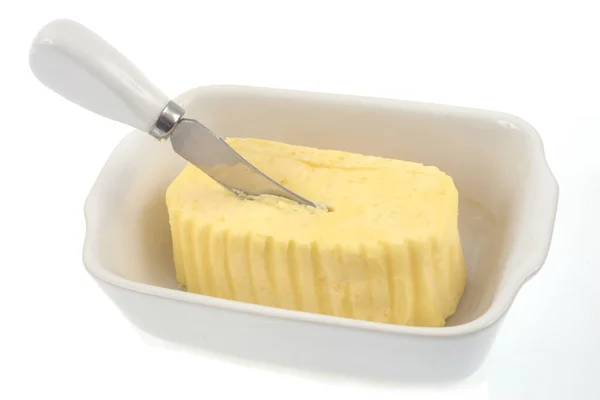 Butter Ramekin Knife Stuck Close White Background — Stock Photo, Image