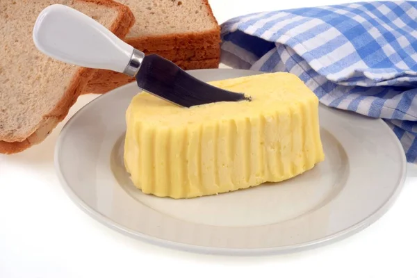 Butter Plate Knife Stuck Next Slices Sandwich Bread White Background — Stock Photo, Image