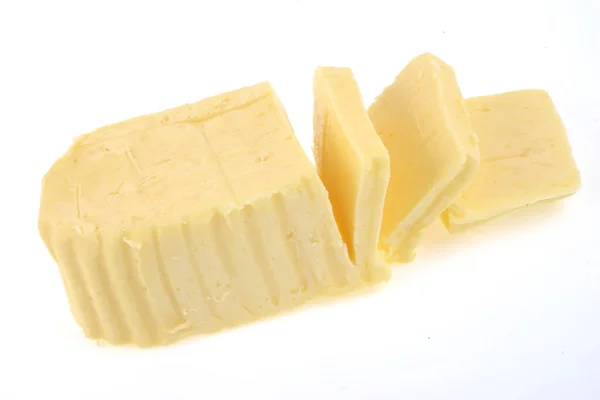 Aufgeschnittene Butter Nahaufnahme Auf Weißem Hintergrund — Stockfoto